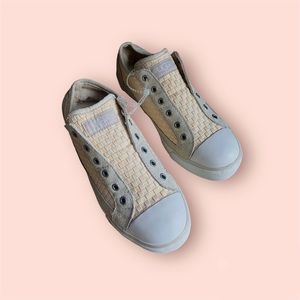 Never worn UGG slip on sneakers with sheepskin lining